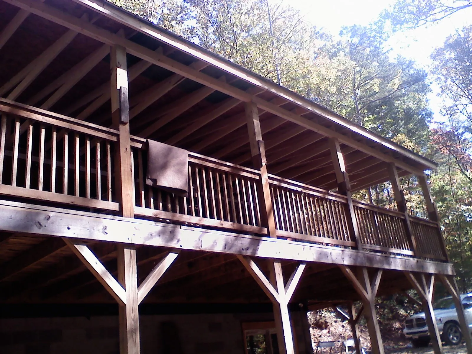 Timber framing under a new elevated porch and deck — Roof Leak Repair in Chimacum by Roofing Brothers
